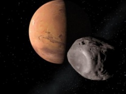 Спутник Марса Фобос начал разваливаться