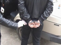 В Полтавской обл. на взятке 5 тыс. грн СБУ поймала двух оперативников полиции