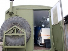 Николаевские волонтеры передали бойцам новую прачечную на колесах