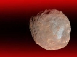 Ученые показали обреченный спутник Марса (ФОТО)