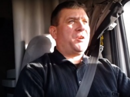Американский дальнобойщик из Украины спел новую песню о злоключениях крымчан и сбитом Су-24