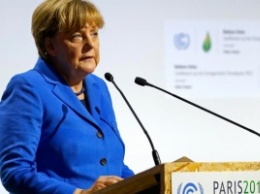 Меркель: Договор по климату должен быть обязательным для всех
