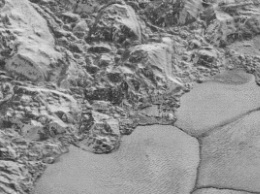 NASA показало сверхточные снимки Плутона