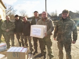 «Согрей солдата»: еще 20 спальников, теплые вещи и обереги николаевские волонтеры доставили военным