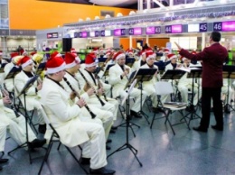 В киевском аэропорту пассажиров будет провожать живой оркестр