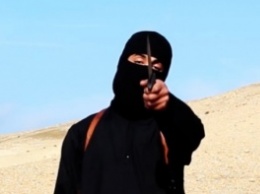 ИГИЛ распространило видео с казнью "британских шпионов" и посланием премьеру Кэмерону
