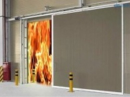 Как защитить склад от огня: выбираем огнестойкие ворота