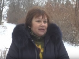 В Николаеве пенсионерка в подъезде встретила воровку в своей одежде и поняла, что ее квартиру только что обворовали