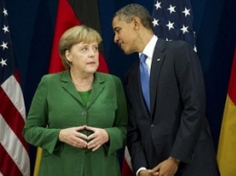 Обама и Меркель обсудили необходимость ускорить выполнение минских соглашений
