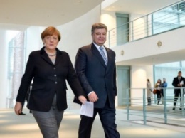 Путин позвонил Меркель после ее встречи с Порошенко