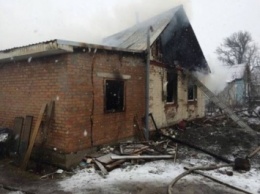 Мужчина в Киевской области выстрелил в женщину из ружья и поджег ее дом