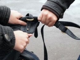 В Николаеве полиция разыскивает свидетеля ограбления, который отчаянно бросился на злоумышленника