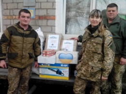 «Согрей солдата»: николаевские волонтеры доставили теплые вещи, бензопилы, обереги и книги в зону АТО