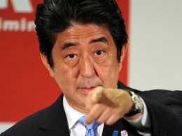 Премьер Японии не менял планов посетить Россию в мае