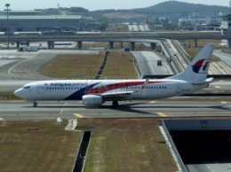 Malaysia Airlines подтвердила, что выплатит компенсации семьям пассажиров пропавшего в 2014 году "Боинга"