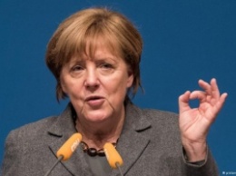Меркель призывает выполнять уже принятые в ЕС решения по беженцам