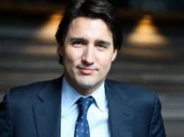 Не следует закрываться от мигрантов стенами - премьер Канады