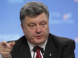 Украина мирно вернет Донбасс в течение года, - Порошенко