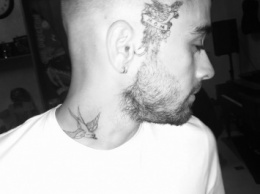 Зейн Малик украсил голову и шею татуировками