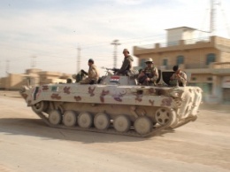Ирак сообщил об освобождении от "Исламского государства" граничащих с Сирией территорий