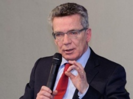 Глава МВД Германии требует санкций для беженцев