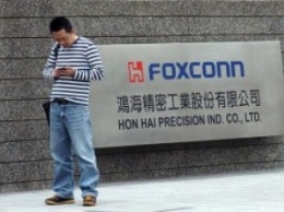 Тайваньская компания Foxconn заменила роботами 60 тысяч работников