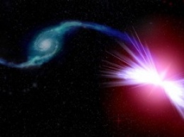 Черные дыры "убивают" галактики с помощью "красных гейзеров"