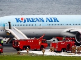 В Токио загорелся Boeing с 300 пассажирами на борту (ВИДЕО)