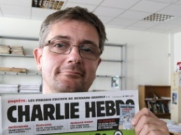 Charlie Hebdo опубликовал карикатуру на воображаемый теракт на матче Россия-Англия