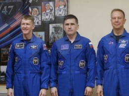 Трое членов экипажа МКС перешли на корабль для возвращения на Землю