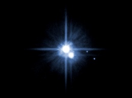 Ученые обнаружили, что два спутника Плутона двигаются абсолютно хаотично