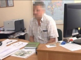 В Одессе задержали инспектора, который просил 200 долларов за выдачу техосмотра судна без его фактической проверки