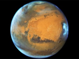 НАСА показало «перевернутый» кратер на Марсе