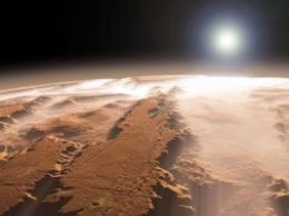 Ученые: На Марсе бывает снег, а на Юпитере шторм