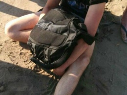 В Киеве патрульный по дороге с пляжа задержал грабителя