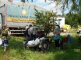 В какие села Донбасса будет доставляться гумпомощь в июле: график выездов волонтеров