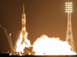 Россиянин, американка и японец летят на МКС на новом "Союзе"