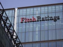 Fitch понизило рекордное количество рейтингов суверенных стран