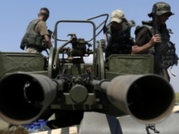 В Донецкой обл. боевики применили БМП, зенитные установки и крупнокалиберные пулеметы, - пресс-центр (видео)