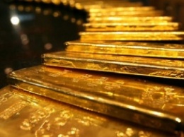Нацбанк снизил цену на золото