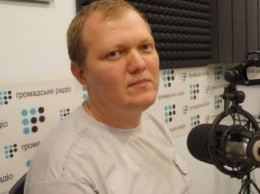 В Киеве избили журналиста Сергея Головнева