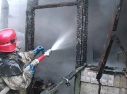 Под Харьковом горел частный дом: хозяйка получила ожоги