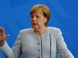 Меркель обещает прояснить варварские акты в Германии