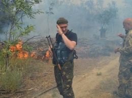 Боевики "ЛНР" из «Града» обстреляли Трехизбенку. Возле тубдиспансера загорелся лес