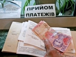 В первом полугодии украинцы практически полностью рассчитались по платежам