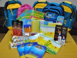 Криворожане закупили первые портфели и собрали школьные наборы для детей-сирот из зоны АТО (ФОТО)