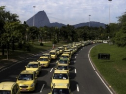 Жители Рио покидают столицу Олимпийских игр перед церемонией открытия