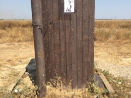 Владелец придорожного туалета в Чаплынке сделал месячную кассу на километровой очереди в Крым