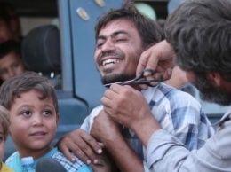 В освобожденный от ИГ сирийский город Манбидж вернулись жители