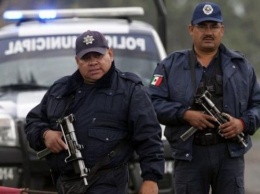 Мексиканских полицейских обвиняют в массовом убийстве